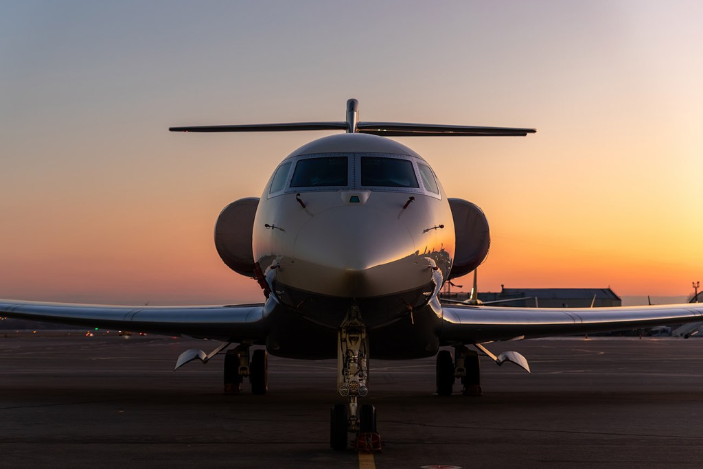 Business jet at golden hour — private aviation charter Feathers Aviation Austin Texas